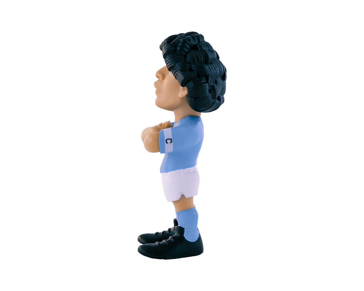 Minix Diego Maradona Napoli figurine with sculpted dark curls, blue jersey, white shorts and black boots, shown in profile.