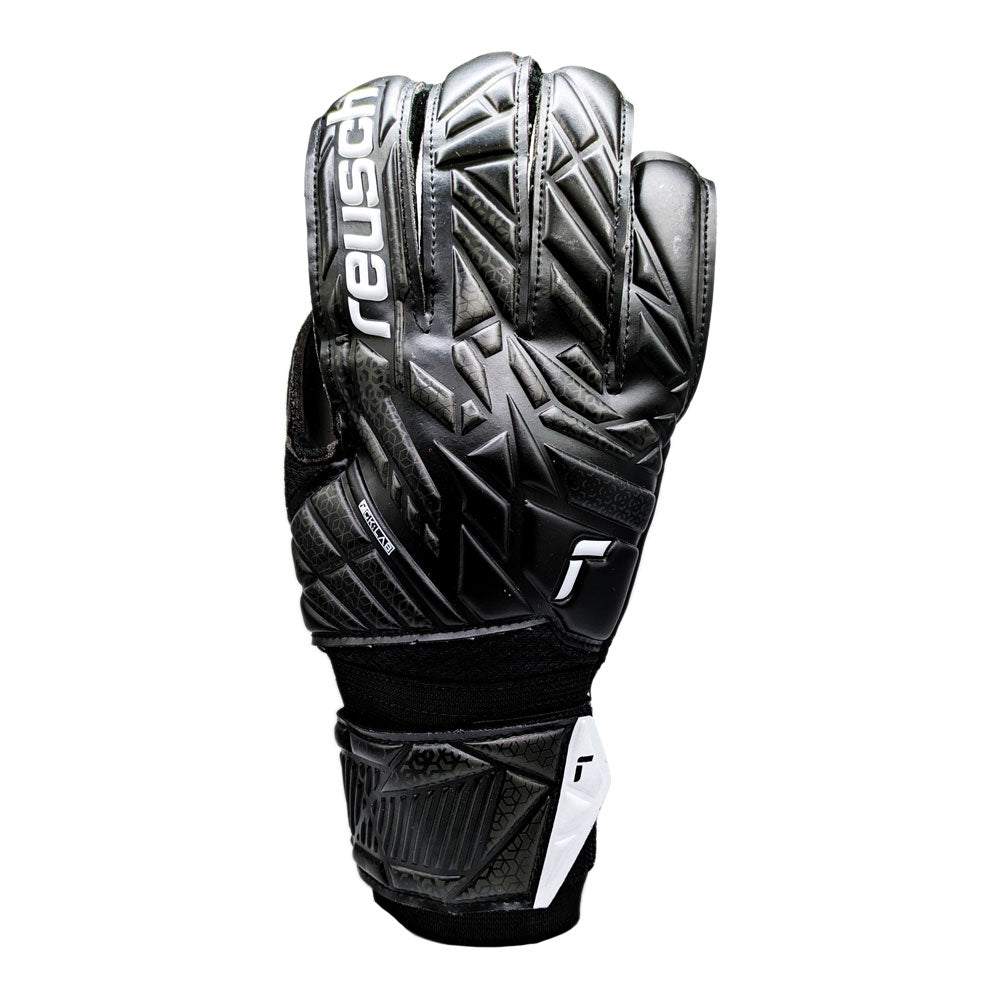Reusch Attrakt Solid black goalkeeper glove with expanse cut, open cuff, and punch foam padding for durability and flexibility.