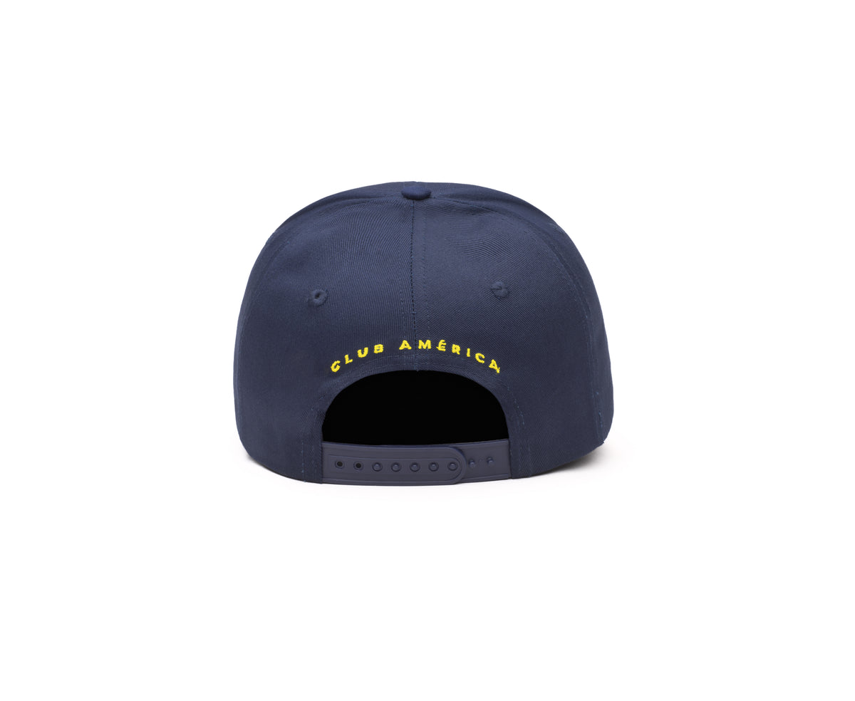 Club America Adjustable Cap in navy polyester twill, with a curved bill, snapback strap, and yellow embroidered lettering.