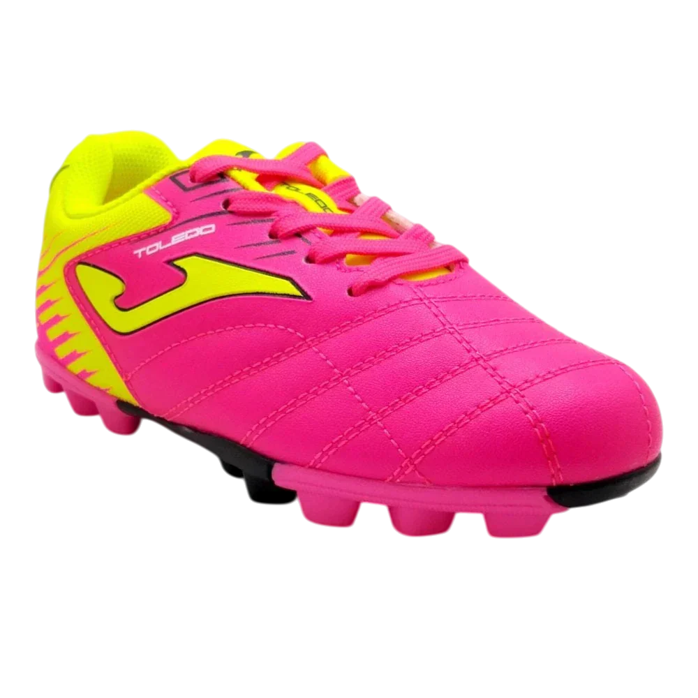 Joma Toledo Junior molded soccer shoes with lightweight synthetic upper and durable rubber outsole for youth players on turf and grass.