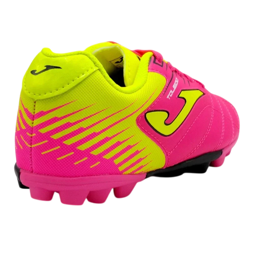 Joma Toledo junior molded soccer shoes with lightweight synthetic Fibertec upper and durable rubber outsole for youth players on turf and grass fields