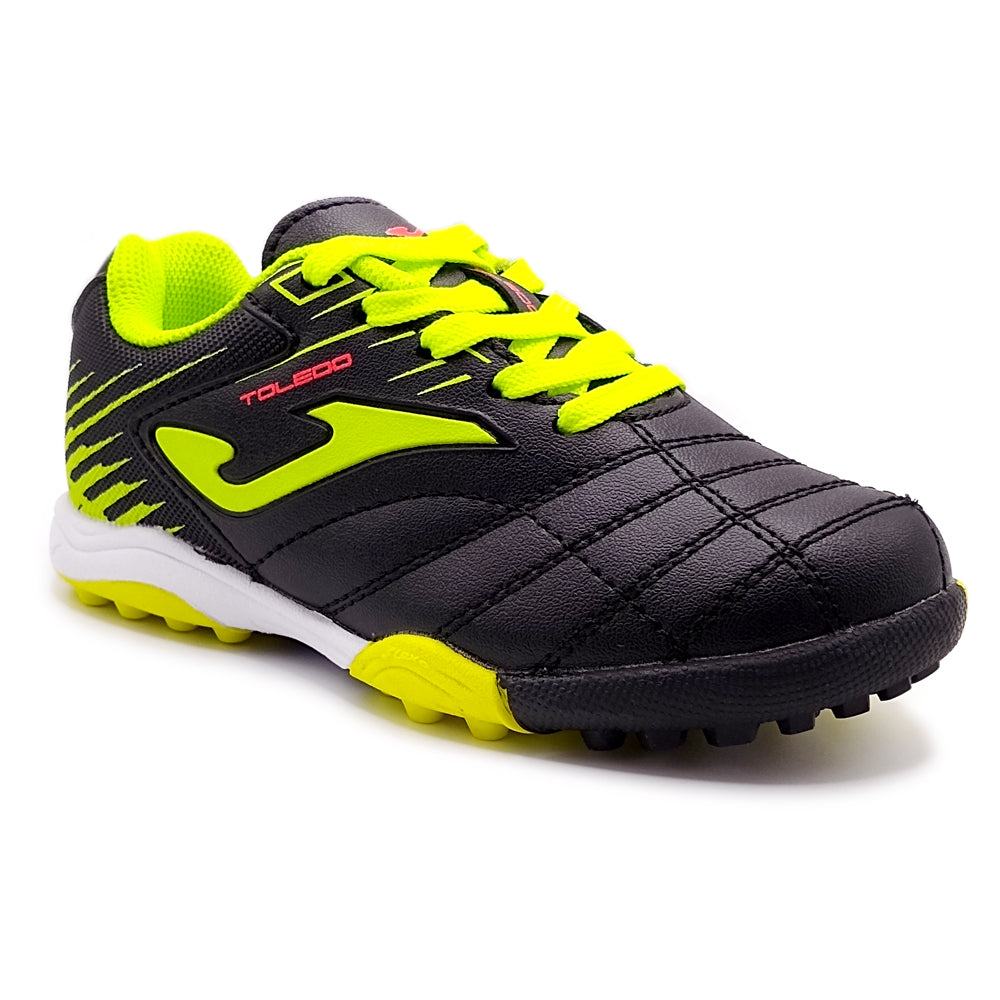 Joma Toledo Junior Turf Soccer Shoes for kids with synthetic Fibertec upper, ergonomic heel, and rubber outsole for traction.