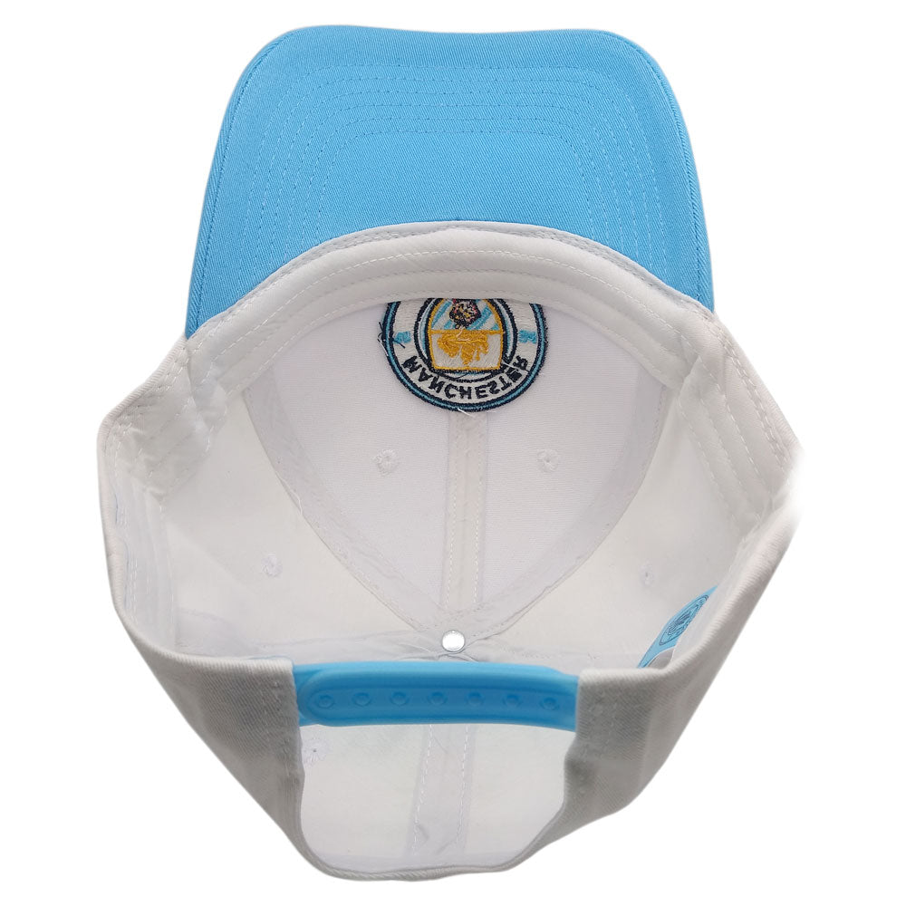 Manchester City Two-Tone Adjustable Cap in sky blue and white, with gray side panels, snapback strap and embroidered crest.