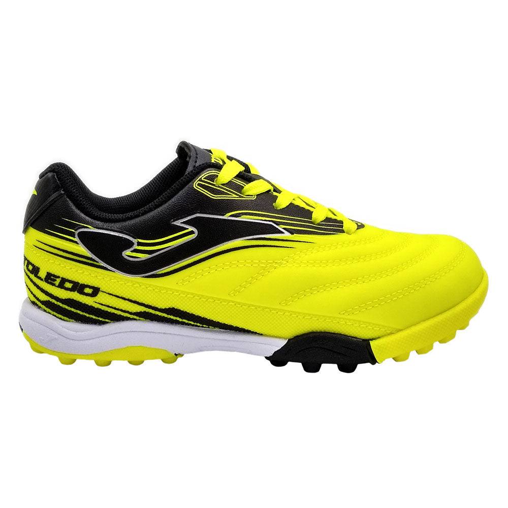 Joma Toledo Junior Turf Soccer Shoes for kids, yellow and black, designed for synthetic and hard natural surfaces.