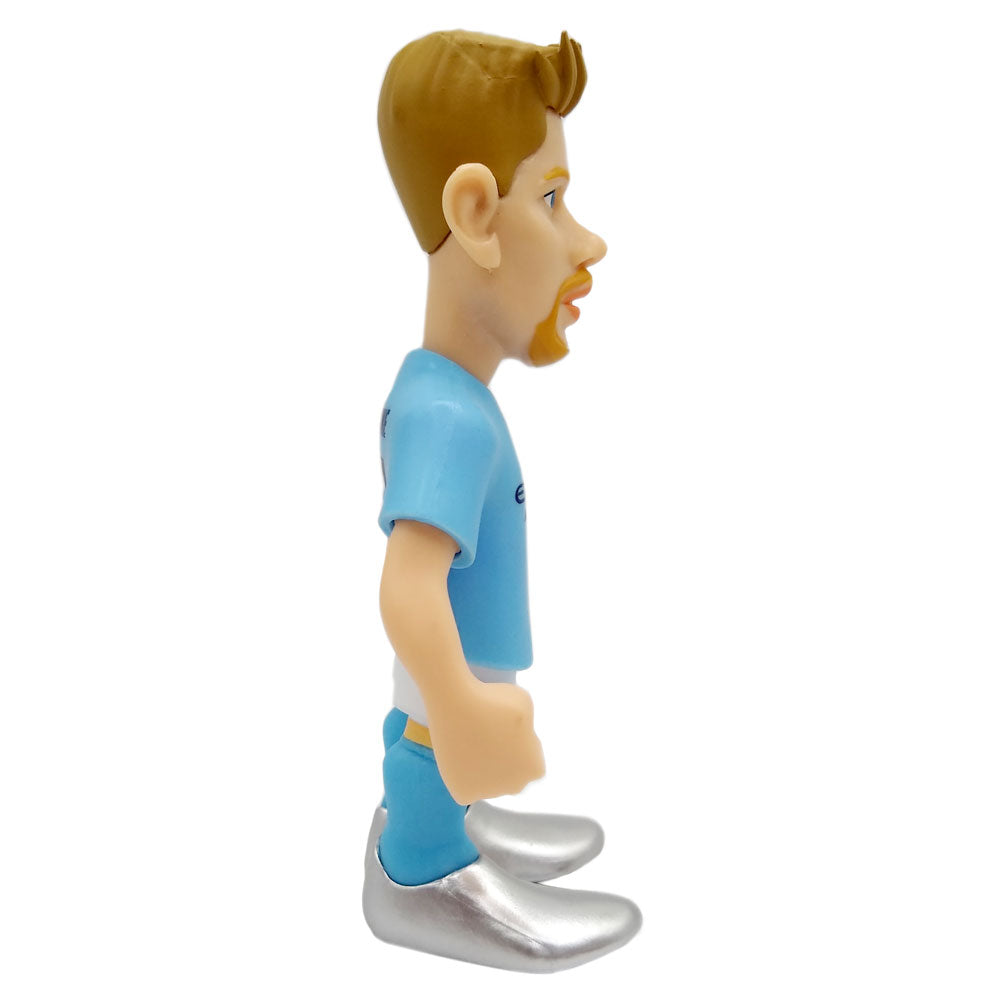 Minix Kevin De Bruyne Manchester City figurine with brown hair, beard, sky-blue kit, and metallic silver boots.