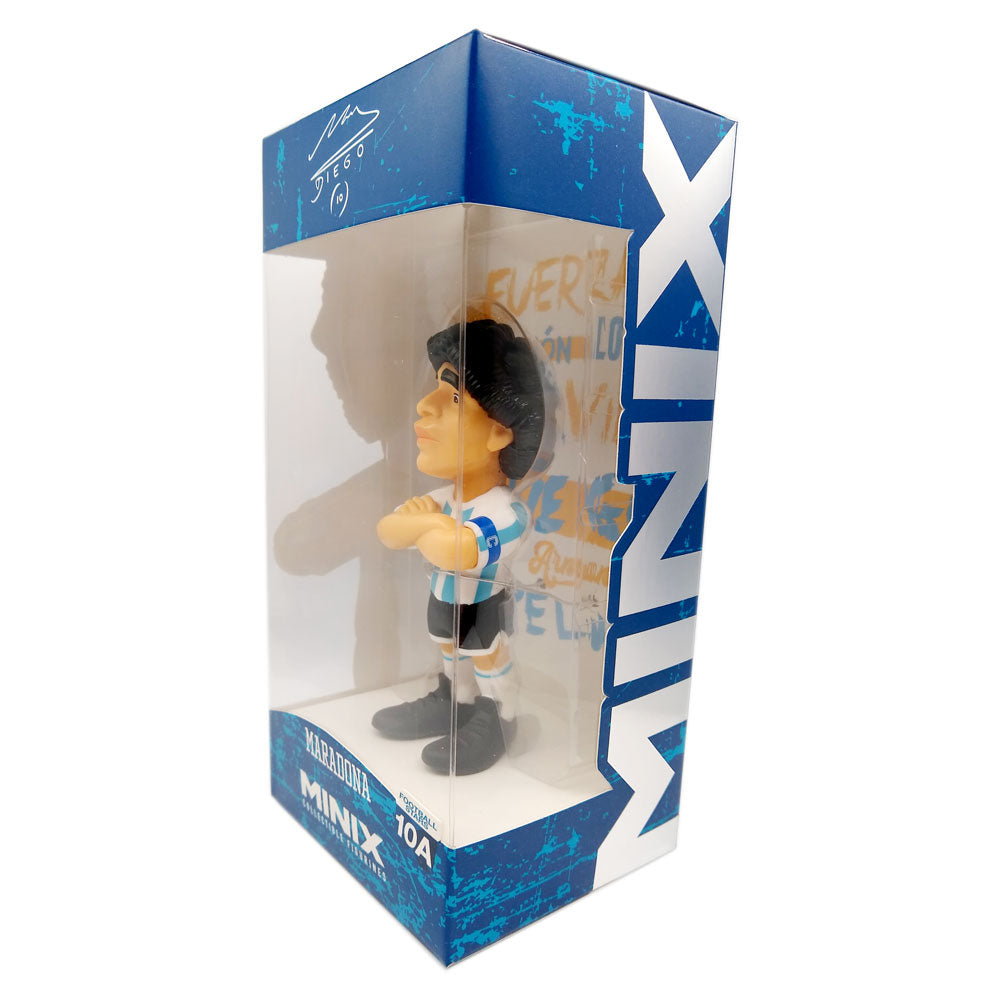 Minix Diego Maradona Argentina Figurine, a small vinyl figure in a sky blue and white striped shirt, black shorts and socks, with dark hair, in a blue display box.