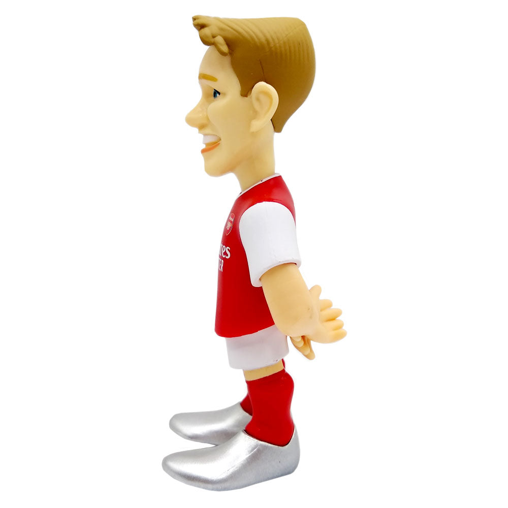 Minix Martin Ødegaard Arsenal figurine with a red and white kit, brown hair, and oversized silver boots.