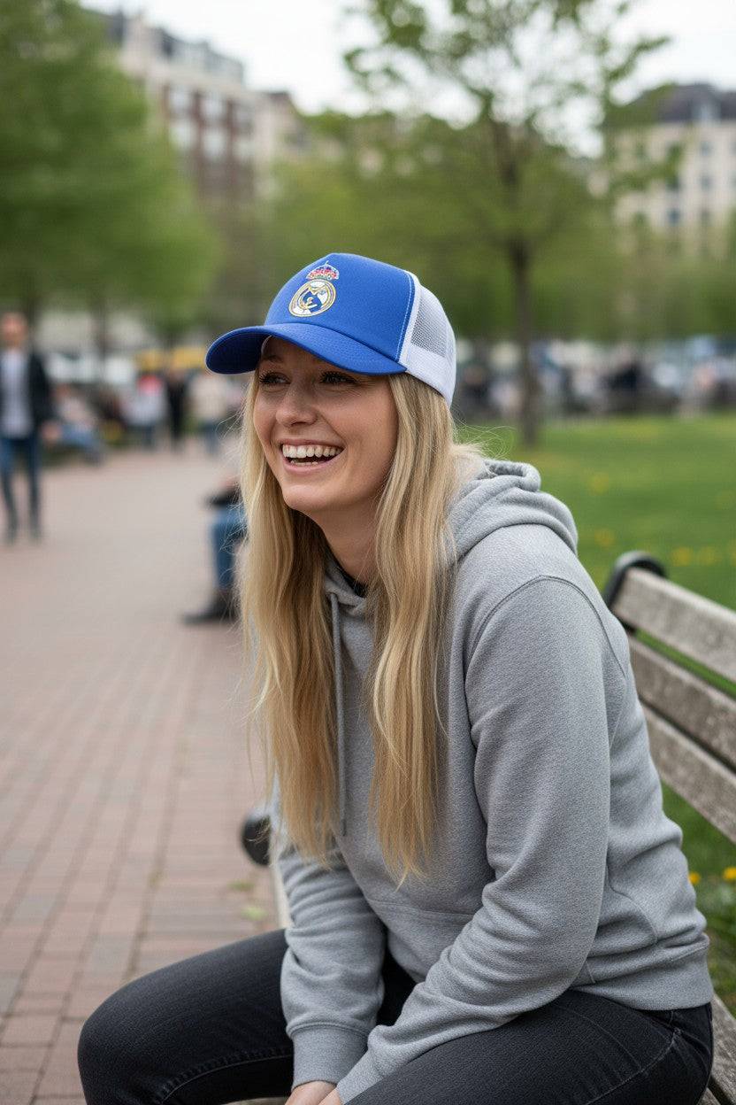 Officially licensed Fan Ink trucker hat with team logo and breathable mesh back for sports fans