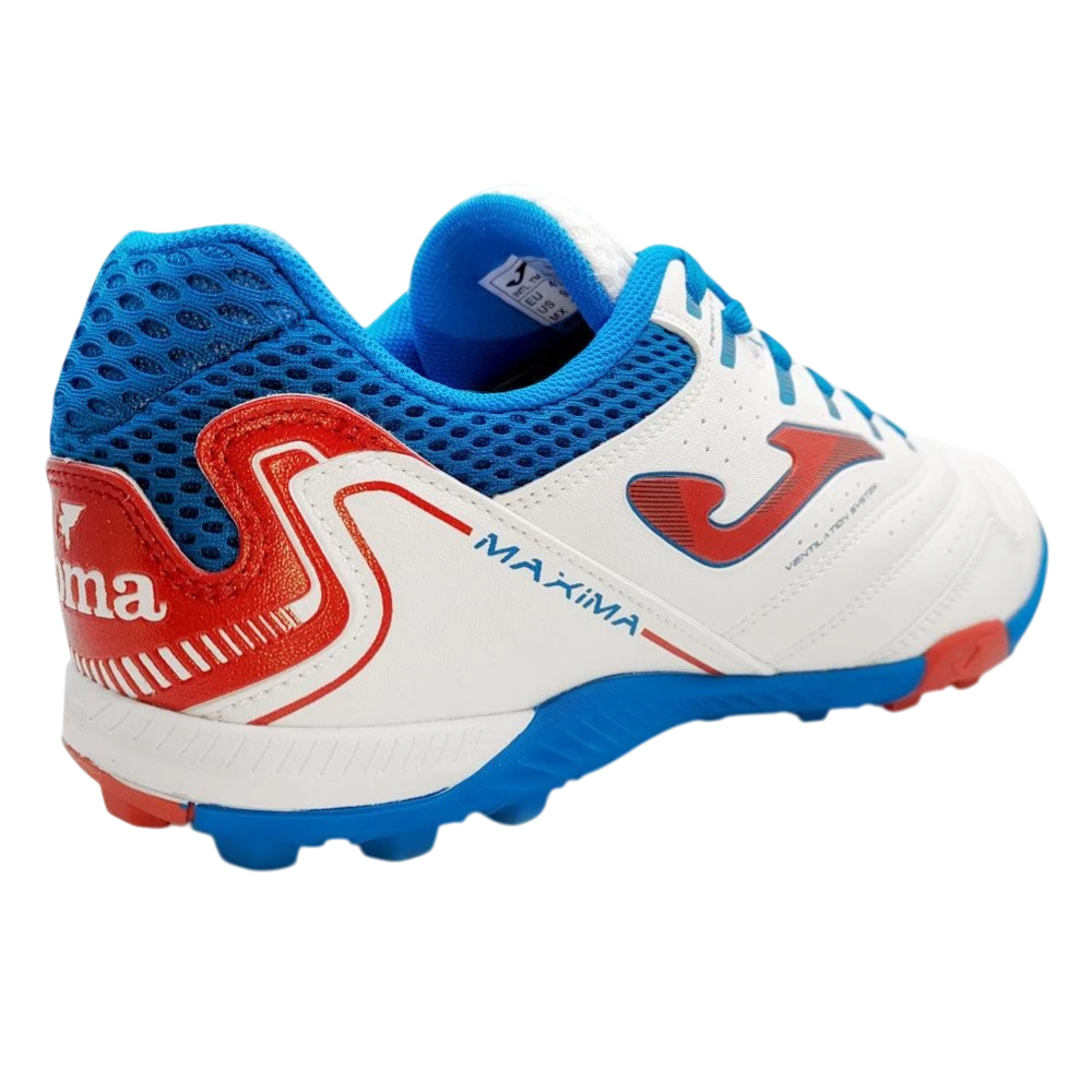 Joma Maxima adult turf soccer shoe in white, blue, and red with studded sole for superior traction and lightweight performance