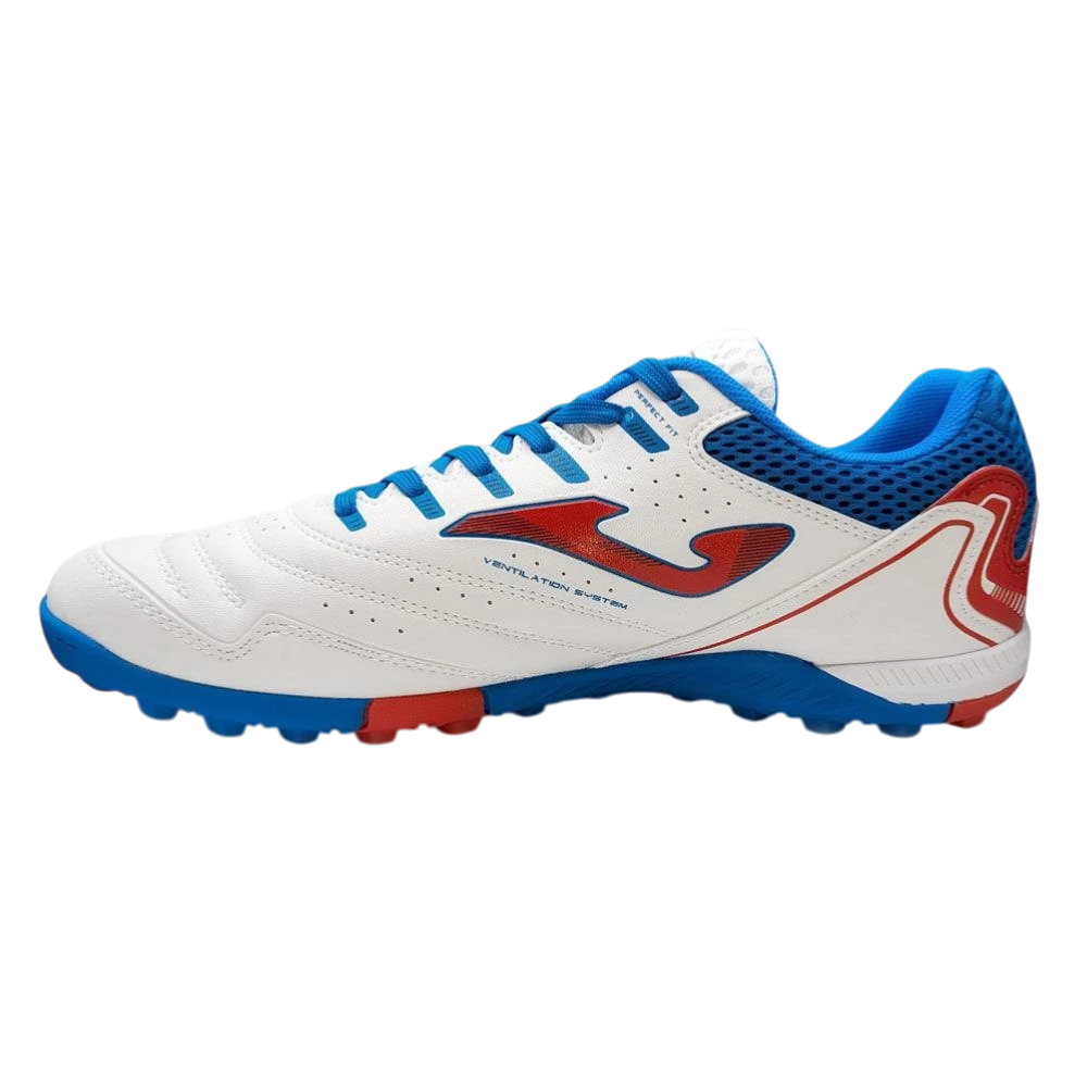 Joma Maxima turf soccer shoe in white with blue and red accents for adult players on artificial turf.