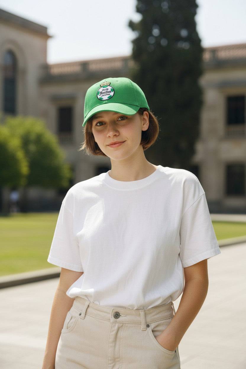 Person wearing a green Fan Ink officially licensed adjustable Football Hat with team logo outdoors