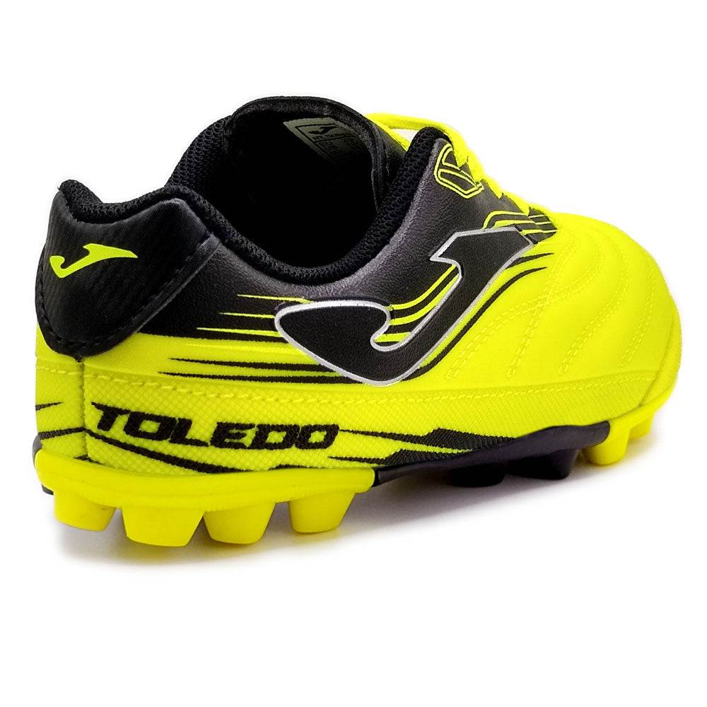 Joma Toledo Junior molded yellow and black soccer shoes with rubber outsole for kids
