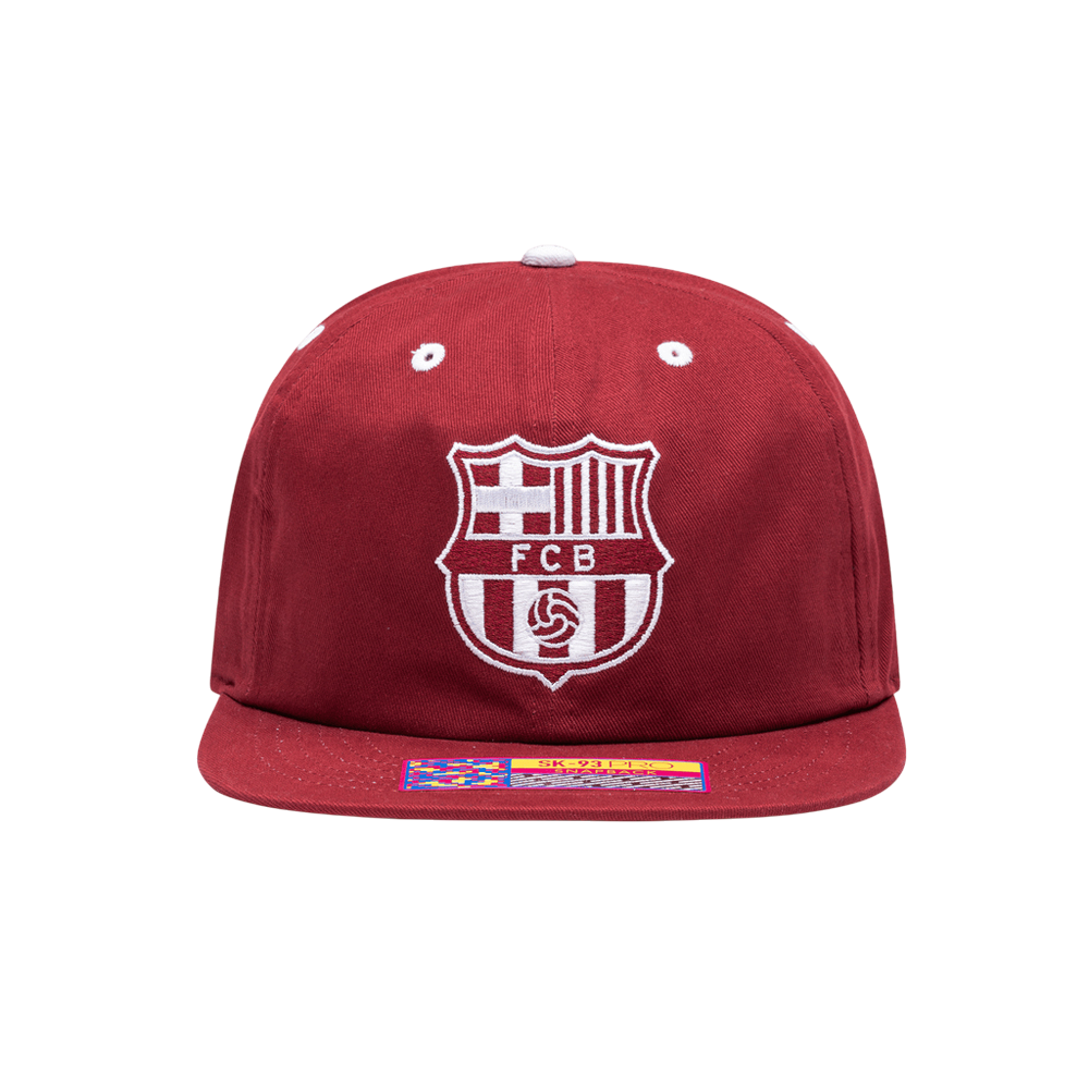 Barcelona Cap in deep red fabric with a white FC Barcelona crest, two white eyelets and a flat brim sticker