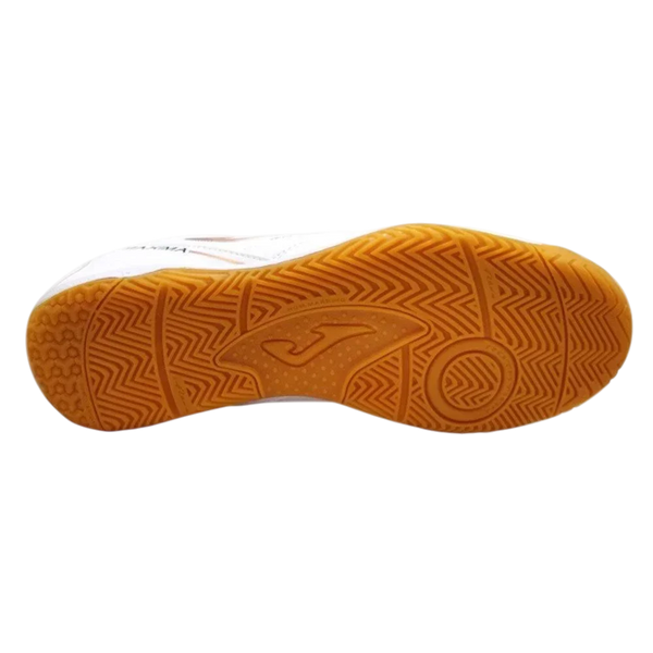 Joma Maxima indoor soccer shoe with a gum rubber outsole, patterned with geometric traction grooves and circular grip zones