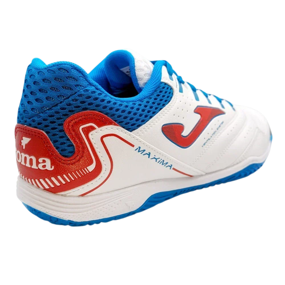Joma Maxima indoor soccer shoe in white synthetic material with blue mesh and red accents, featuring a flat rubber sole
