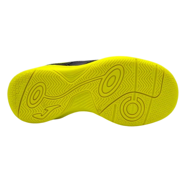 Joma Toledo indoor soccer shoe with a bright neon yellow rubber outsole and molded circular grip patterns
