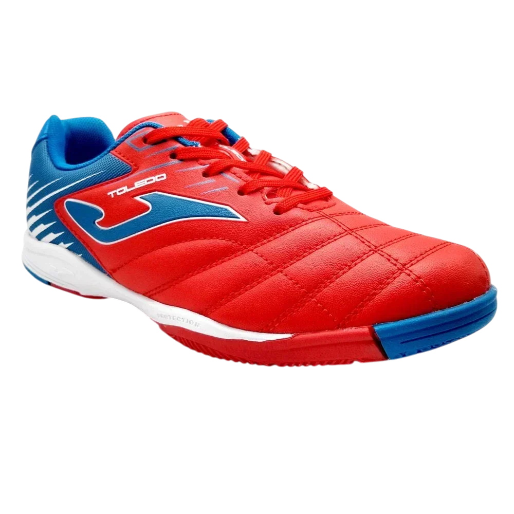 Joma Toledo indoor soccer shoe in red synthetic material with blue accents, white Joma logo and quilted forefoot