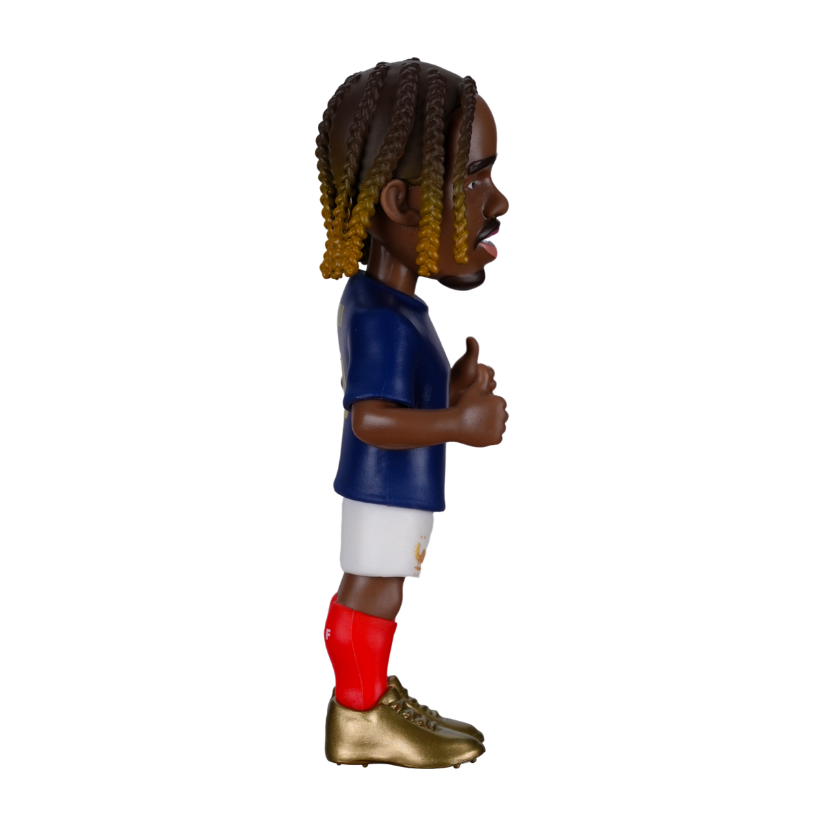 Minix Bradley Barcola collectible football figurine in a navy shirt, white shorts and red socks, with braided hair.