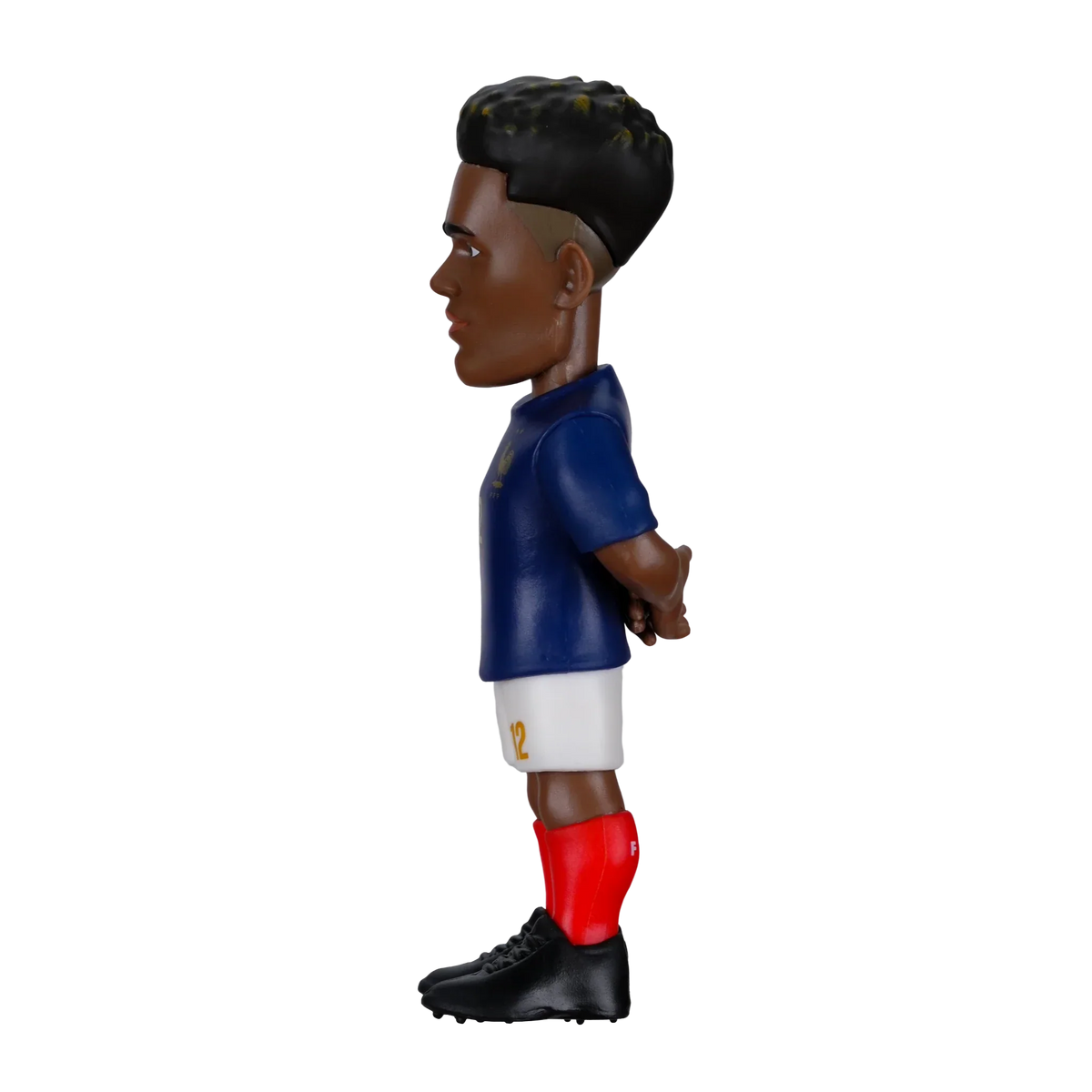 Minix Désiré Doué football figurine in a navy blue shirt, white shorts and bright red socks with molded black hair