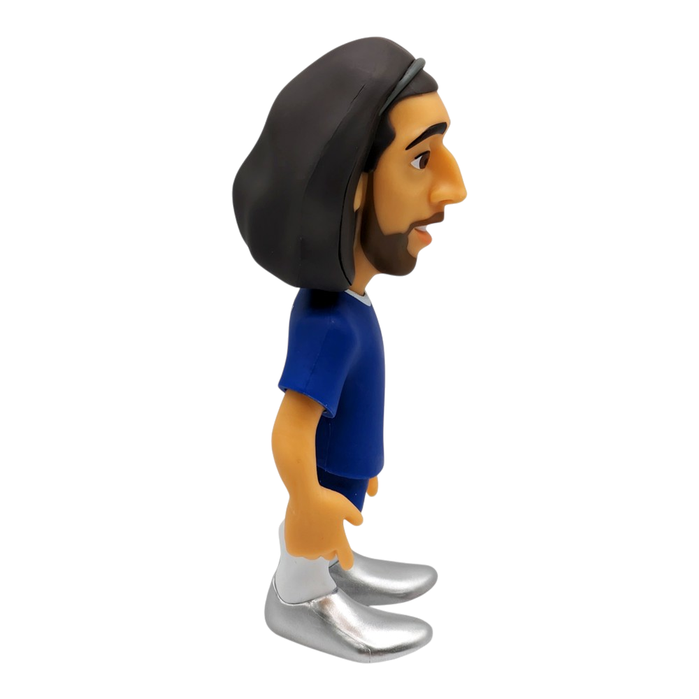 Minix Marc Cucurella Chelsea figurine with long dark hair, beard, blue shirt, and silver shoes