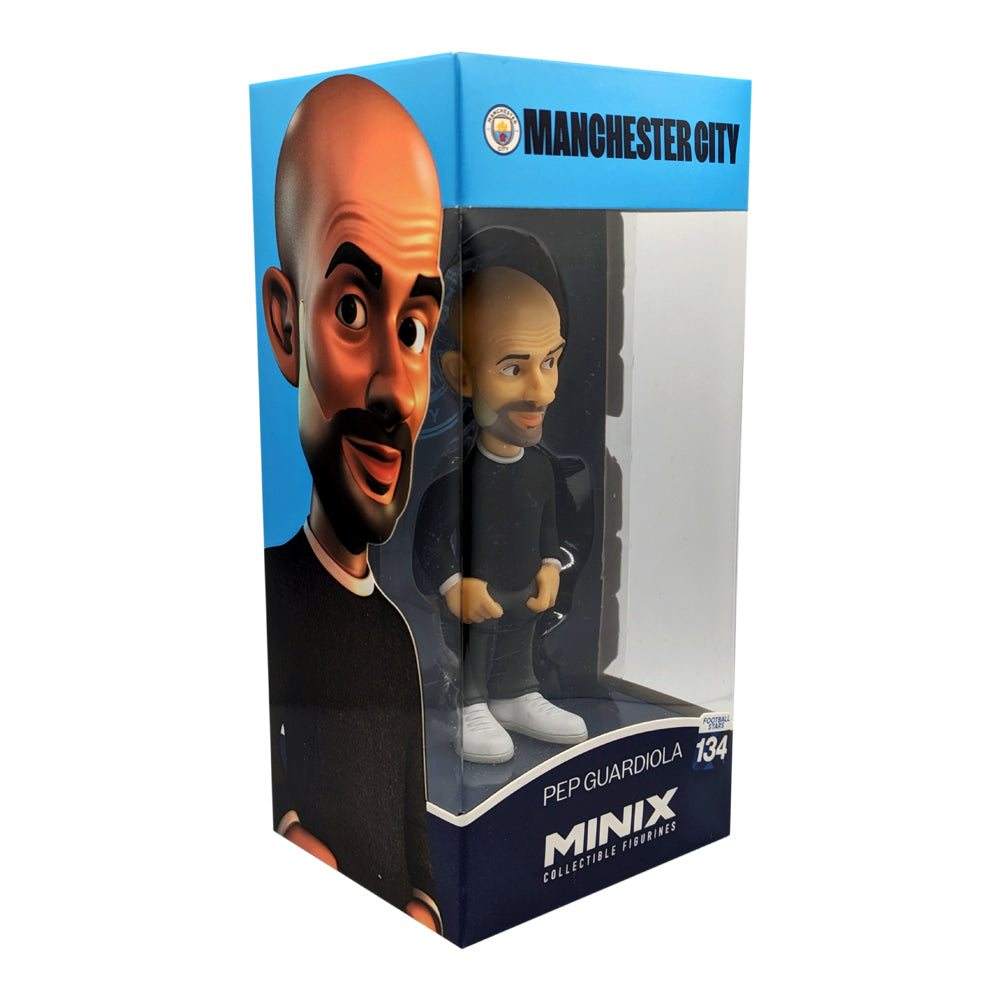 Minix Pep Guardiola Manchester City figurine in black outfit and white shoes, displayed in a blue branded window box