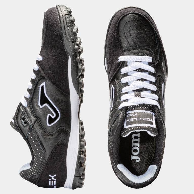 Joma Top Flex Turf Soccer Shoe in black leather, designed for flexibility and stability on turf surfaces.