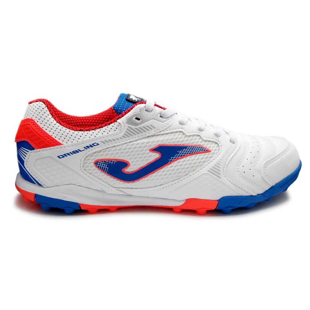 Joma Dribling Turf Adult Soccer Shoes in white with blue and red accents, designed for durability and indoor play.