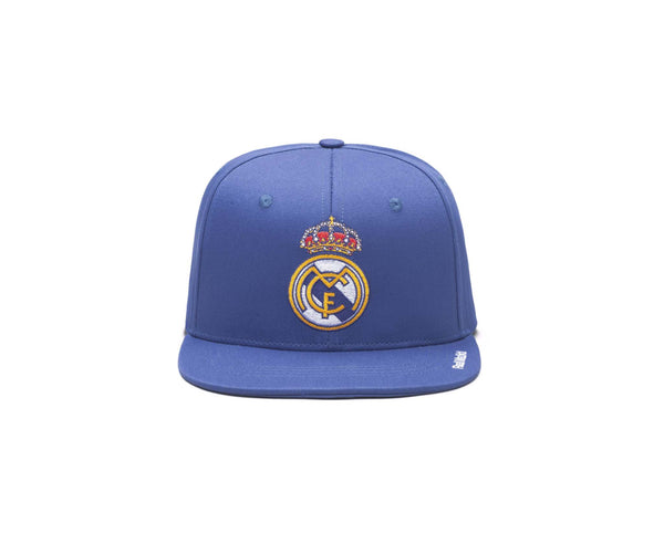 Blue snapback hat with official Real Madrid team logo embroidered on front