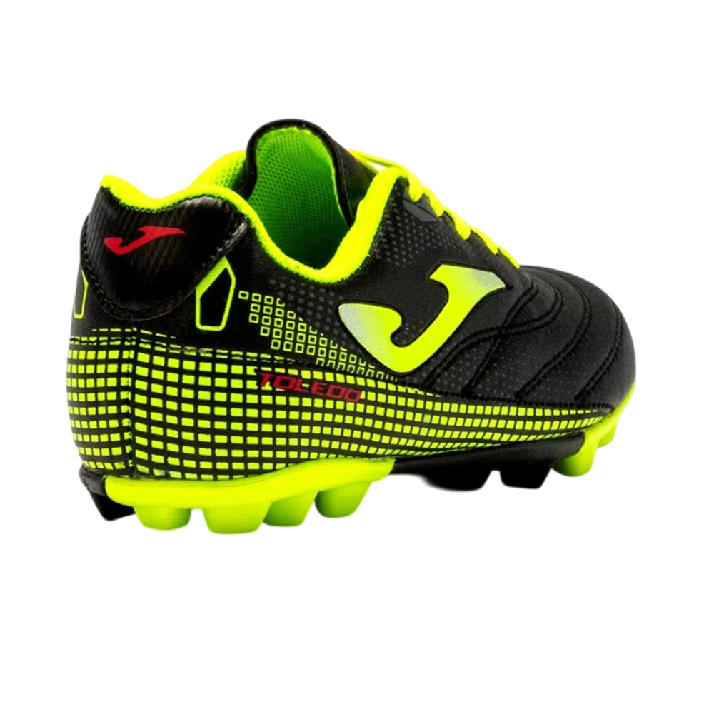 Joma Toledo junior molded soccer shoes with synthetic upper and durable rubber outsole for youth players