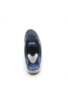 White Joma Maxima unisex futsal shoe with synthetic upper and rubber sole