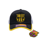 FC Barcelona One8th Strike Trucker Hat with interchangeable front patch, black and yellow design, breathable white mesh back, and adjustable snapback fit.