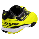 Joma Toledo Junior Turf Soccer Shoes in yellow and black with synthetic Fibertec upper and rubber outsole.