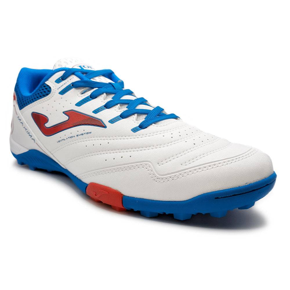 Joma Maxima white and blue turf soccer shoe with red logo and vibrant design