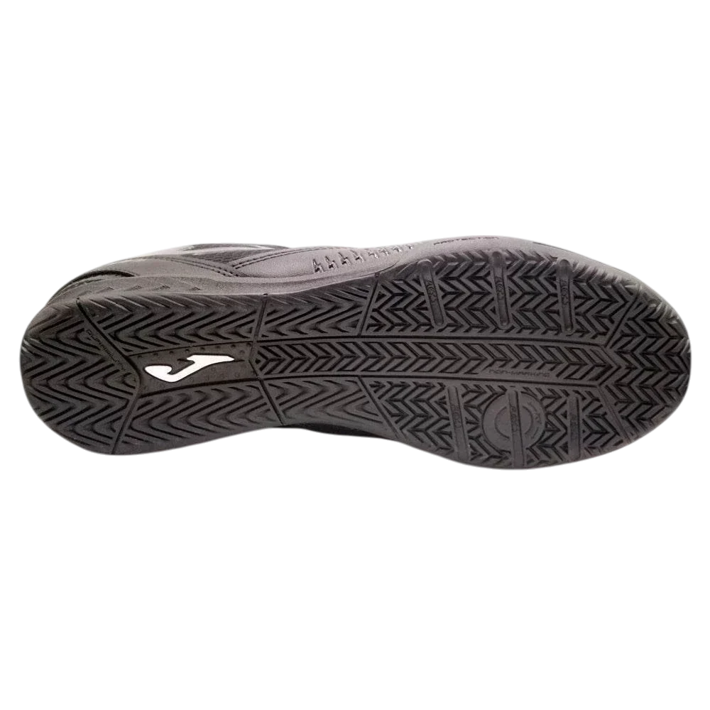Joma Dribling indoor soccer shoe with a black rubber outsole, deep geometric tread and white Joma logo