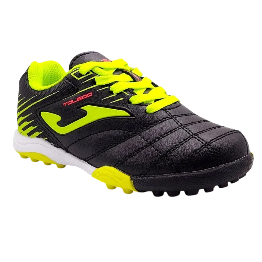 Joma Toledo turf soccer shoe in black synthetic material with neon yellow laces, accents and rubber studs