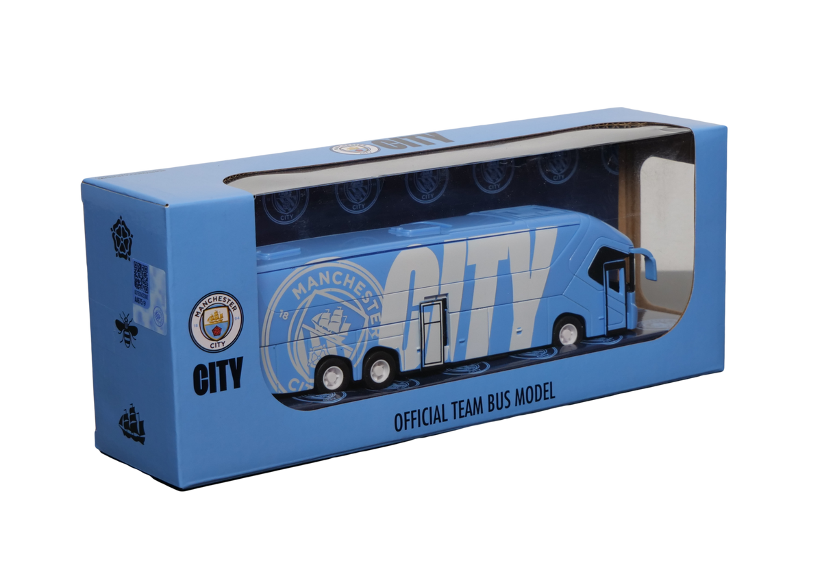 Manchester City Mini Team Bus, a blue miniature coach with crest and large CITY graphics, displayed in branded packaging