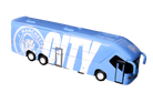 Manchester City Mini Team Bus in sky blue with white club lettering and crest, featuring a miniature coach design