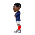 Minix Kylian Mbappé football figurine with dark skin, short black hair, blue shirt, white shorts, red socks and silver boots