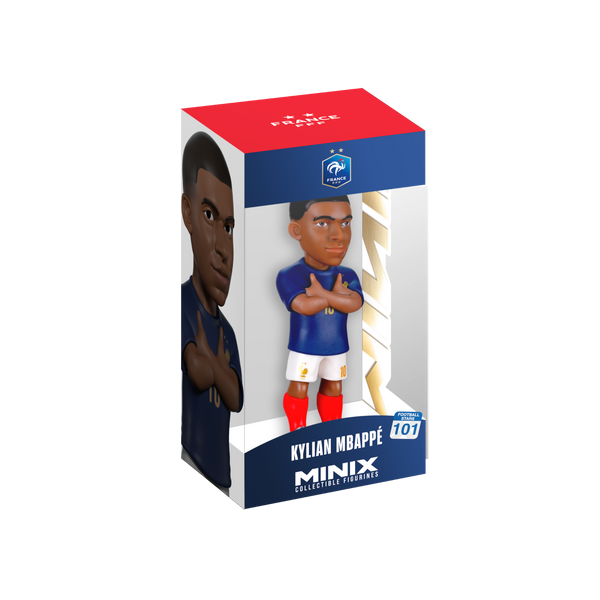 Minix Kylian Mbappé France figurine with dark skin, short hair, blue shirt, white shorts and red socks in a display box