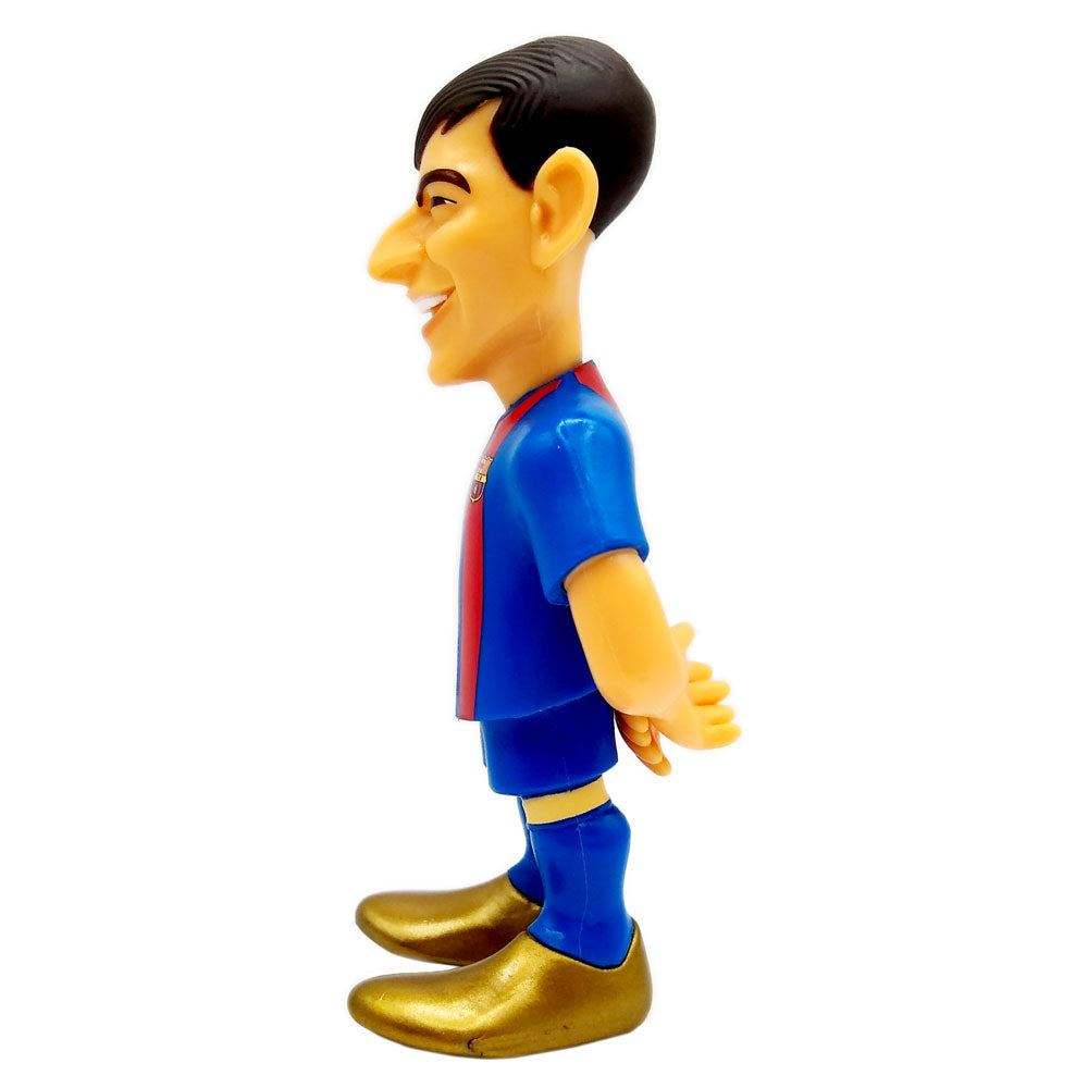 Minix Pedri FC Barcelona figurine in a blue and red kit, with black hair and gold shoes, shown in profile