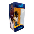 Minix Pelé Escape to Victory Edition figurine in a white football kit and blue boots, displayed in a blue and orange box