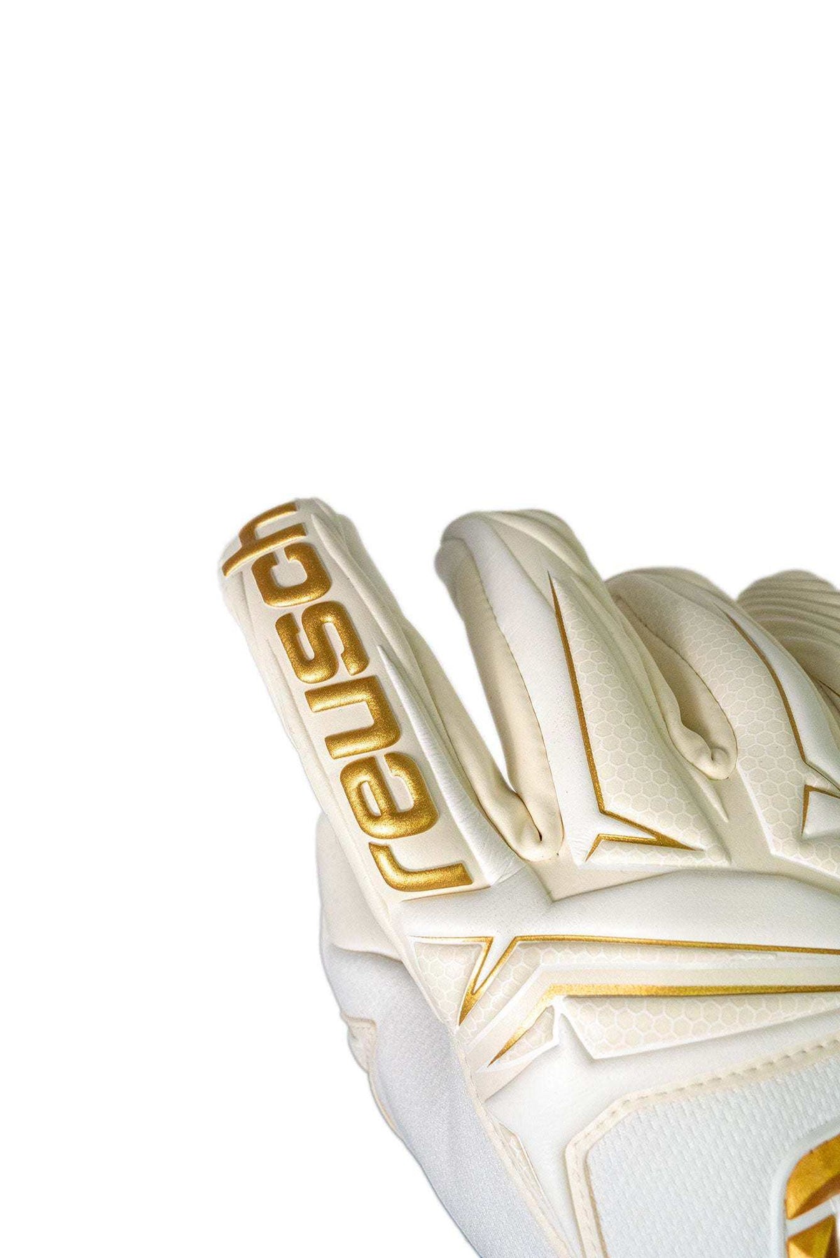 Reusch Attrakt AB1 goalkeeper glove in white with gold lettering and angular raised details across the backhand